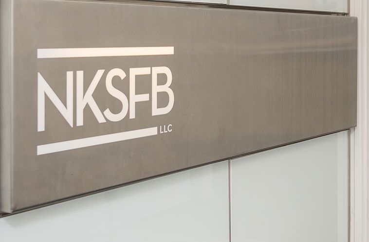 A sign with the NKSFB logo on it