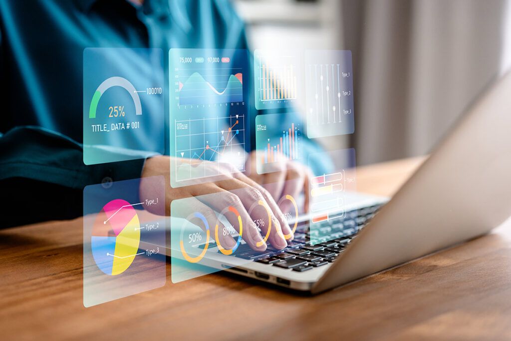 laptop with hologram graphs