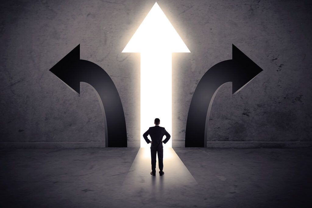 man in front of three arrows
