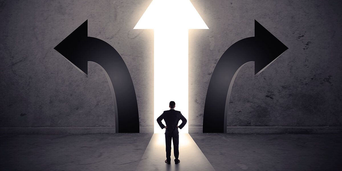 man in front of three arrows