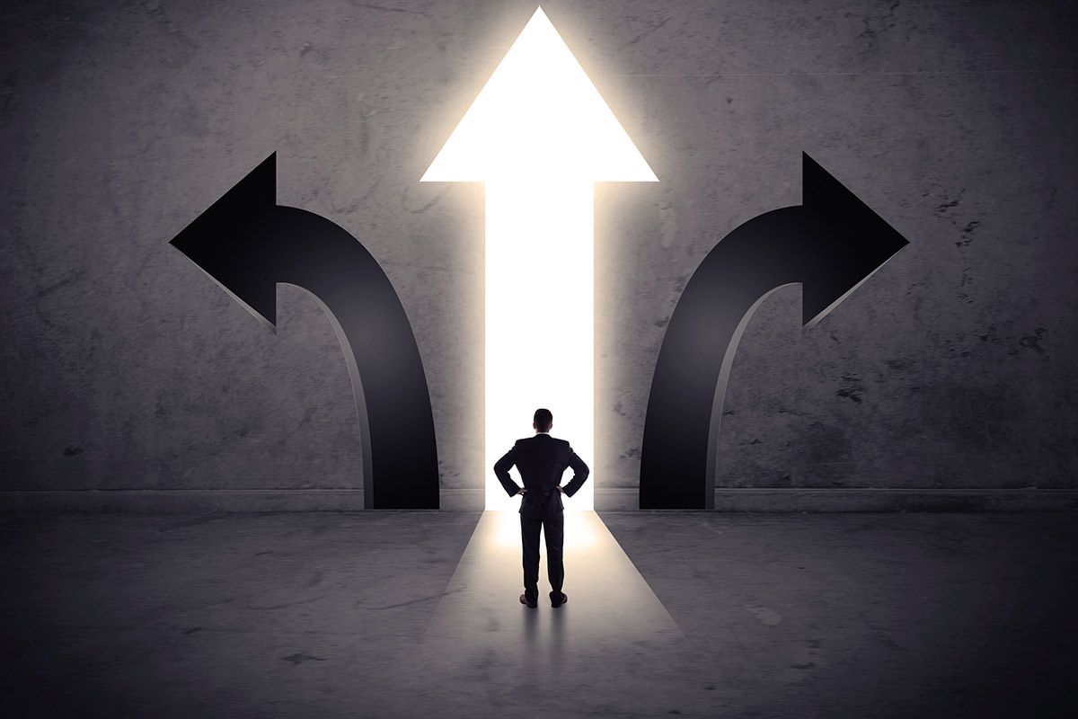 man in front of three arrows