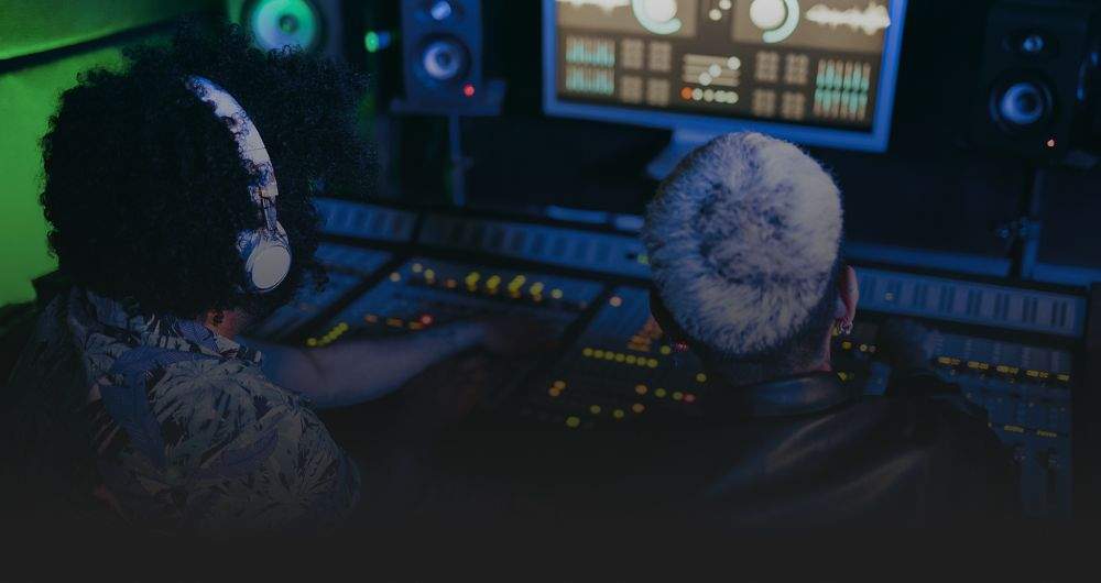 People working in a recording studio
