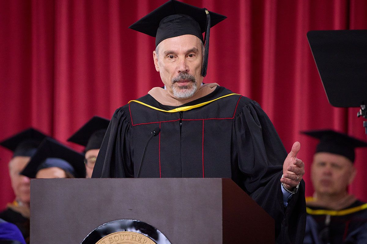 Michael Karlin giving a commencement speech