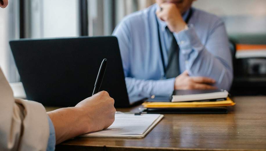 Two people working in an office