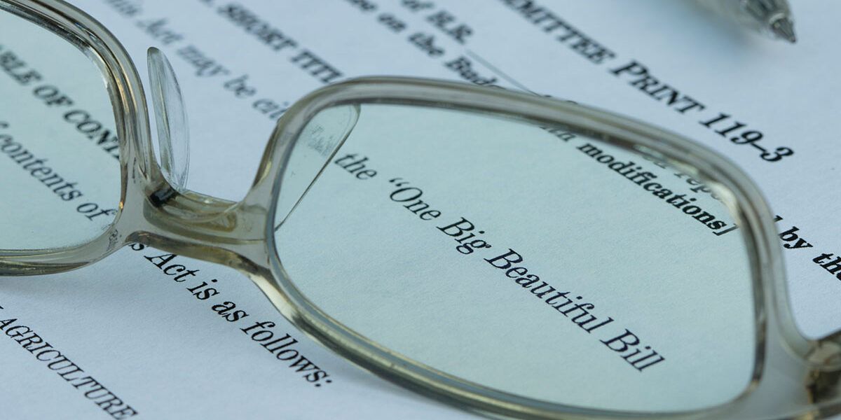 document with glasses on top