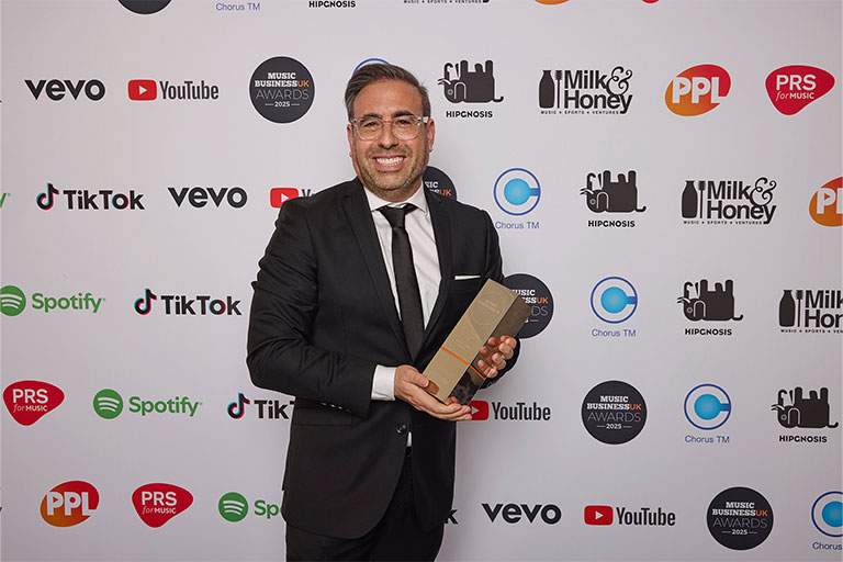 Daniel Ross with award