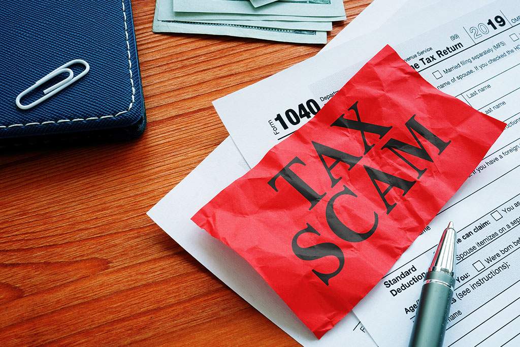 Featured image for post Protect Yourself From Fraudsters Impersonating The IRS And Other Tax Scams