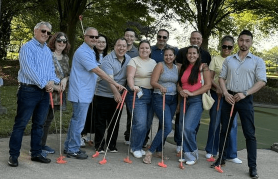 group of people with clubs
